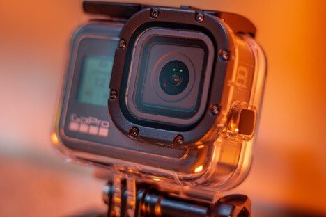 This is an image of a GoPro camera placed inside a waterproof plastic case.