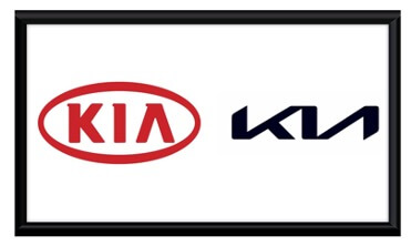 This is an image of the old red KIA logo and the new black KIA logo next to each other. The new logo, as specified in the article, is simplified.