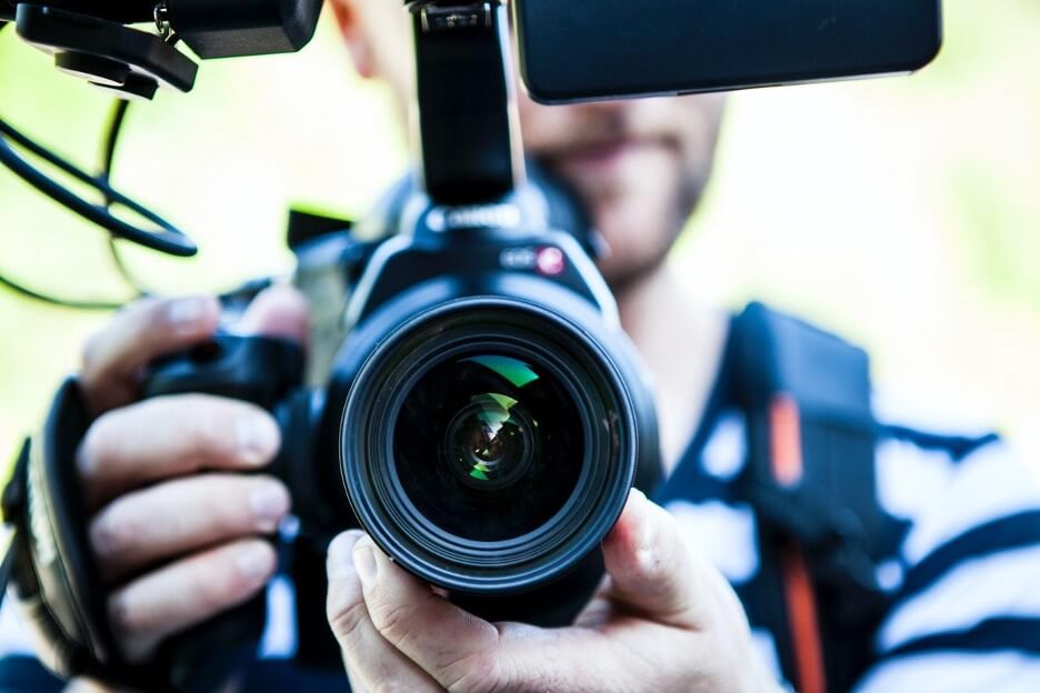 This is an image of a focal lens of a Canon DSLR camera pointed directly at the viewer.