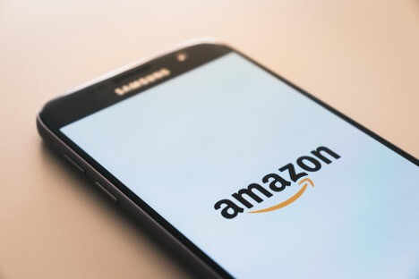 This is an image of a Samsung phone with a logo of Amazon displayed on the screen.